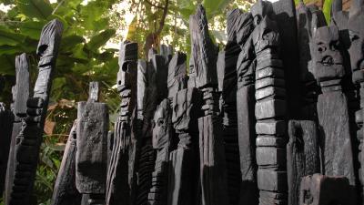 Carved wooden sculpture in Rainforest Biome at Eden Project